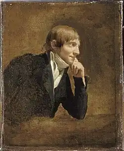 An oil on canvas in brown tones of a white man with short brown hair. He is sitting side-on, facing to the right of the picture, with his chin on his left hand. He wears a frock coat and shirt with a wide neck tie. He has a faint smile.