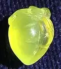 Carved yellow prehnite pendant, 2.4 cm × 1.8 cm, 5.5 grams