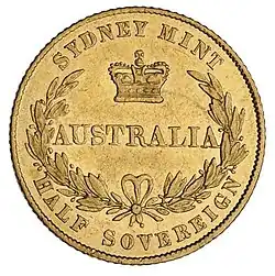 Gold coin showing a wreath enclosing AUSTRALIA