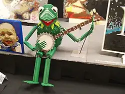 A statue of Kermit at BrickCon 2013