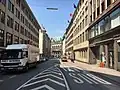 Building at Rathausstrasse 7 in Hamburg (right, with flags above), the bank's head office from the early 1960s[17]