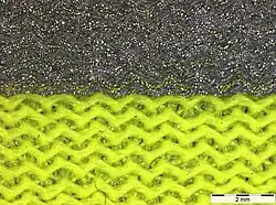 Retroreflective material in light microscope, magnification 8 ×