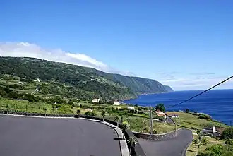 View of the coastal zone of Ribeira Seca, with the village of Lourais in the distance.