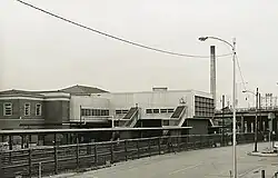 A black-and-white image of an abandoned train station