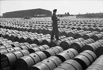 Drums of aviation fuel 1945