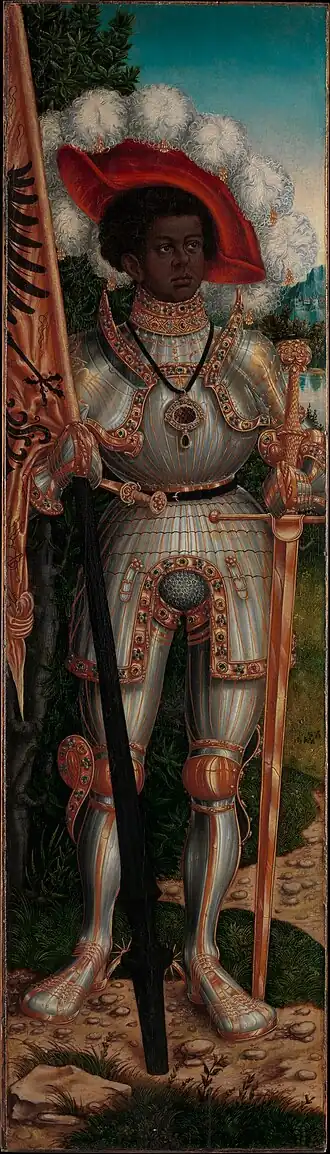 Saint Maurice by Lucas Cranach the Elder (1472–1553), depicted wearing a full silver armour that was either made for Maximilian I(later acquired by Emperor Charles V) or commissioned by Cardinal Albrecht of Brandenburg for Charles V to be used in his coronation in Aachen in 1520.[12][13][14]