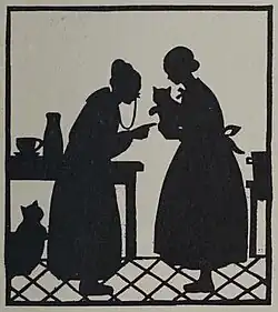 Silhouette of a kitchen scene where an old woman points at a cat another woman holds