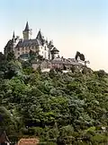 Image 23Coloured black and white photograph: the Burgberg with Wernigerode Castle (between 1890 and 1905) (from List of mountains and hills of the Harz)