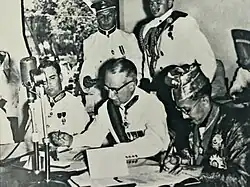 Brunei Agreement and Constitution, signed in 1959 by the Sultan Omar Ali and Sir Robert Heatlie Scott