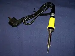 Soldering iron, used to melt solder in electronic work