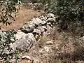 Reused stones that form a wall at Chezib (Achzib) of Judah