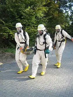 Level B/type 2 suit. SCBA is outside