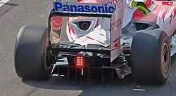 Double Decker diffuser of a Formula One car (Toyota TF109). Note channels above the main diffuser on either side of the light.