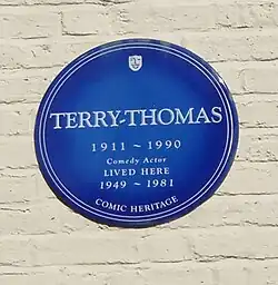 blue plaque commemorating Terry-Thomas