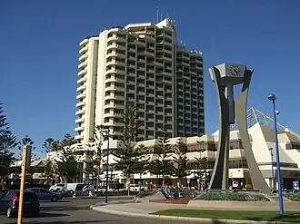 A high rise hotel building photographed from the ground