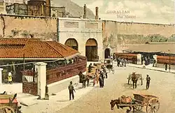 Old postcard of the Public Market outside Grand Casemates Gates as viewed from West Place of Arms.
