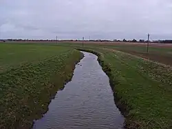 River Foss viewed from Towthorpe Bridge towards Strensall, 54°01′30″N 1°03′12″W﻿ / ﻿54.024888; -1.053412