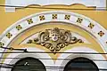 A mascaron above one of the windows