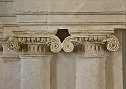 Ionic capitals of the fireplace of the Tornié hotel.