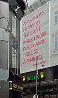 "As long as he makes the cash while I work for change, I will be a feminist.", Tuchlauben, Vienna, Austria[20]