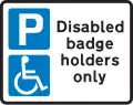 Parking place reserved for disabled badge holders only