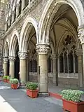 The architectural style is a mix of Venetian Gothic and Neoclassical