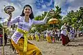 Balinese women wearing kebaya in Melasti ritual ceremony, a self-purification ceremony to welcome Nyepi by all Hindus in Bali