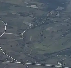 Vega Redonda with the Sagua la Chica River and the Carretera a El Santo