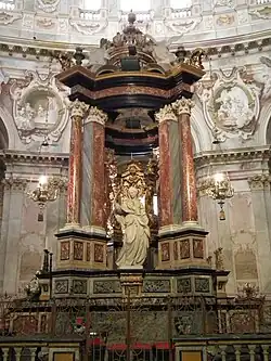 One of the statues on the main altar, representing either hope or charity
