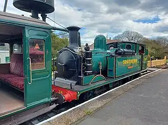 A Steam locomotive at the platform.