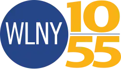 At left, a blue circle with white, thin WLNY lettering inside. Outside the circle is a gold 10 on top of a thin blue line on top of a gold 55.