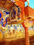 Wall paintings outside Thagthok Gompa