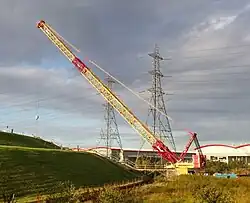 Weldex crane below embankment.