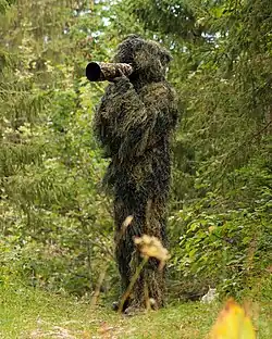 Wildlife Photographer in a ghillie suit