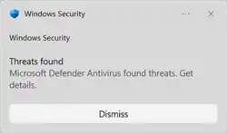 Screenshot of Windows Defender notification toast in Windows 8, reporting taking action to clean detected malware.