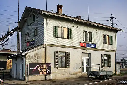 Two-story building with gabled roof