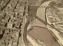 The four track viaduct in 1928, with the Sandridge Bridge crossing the Yarra and the turning basin still in use.