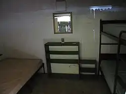 The interior of a room in a Housekeeping Camp lodging unit.