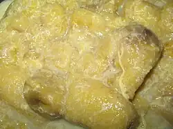 Banana in sweet gravy, known as pengat pisang in Malaysia