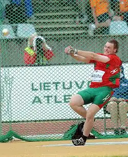 Image 31Yury Shayunou spinning with the hammer within the circle in hammer throw (from Track and field)