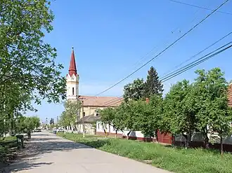 Road of Zădăreni with the Greek Catholic church, erected in 1777[1]