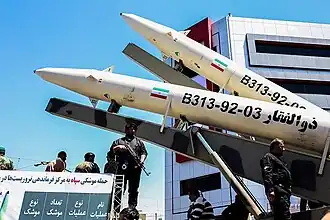 Two Zolfaghar missiles mounted on a launcher