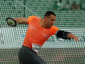 Image 23Zoltán Kővágó preparing to spin and throw in discus throw (from Track and field)