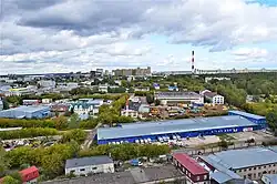 Вид на промзону со стороны жилого комплекса «Родина» в 2021 году