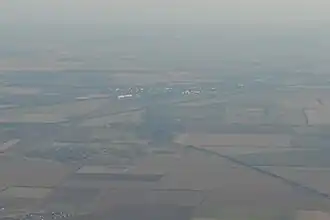 Красногвардейское с воздуха с юга, на переднем плане Марьяновка