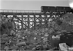 Временно восстановленный после подрыва русскими при отступлении мост через р. Тохмайоки, 31 июля 1941 год.