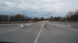 Въезд в деревню с трассы А119