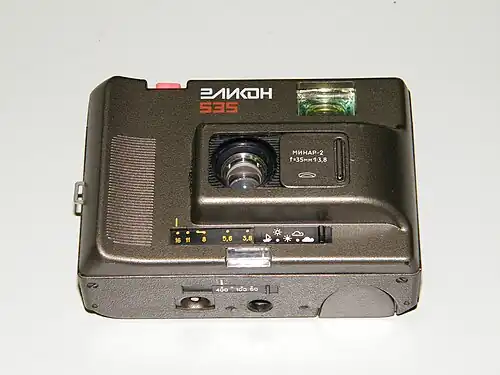 Табличный экспонометр и регулятор диафрагмы