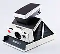 Складной зеркальный фотоаппаратPolaroid SX-70
