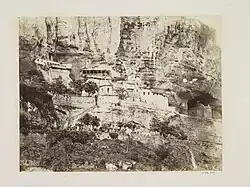 Фото 1869 года. Бахчисарайский Свято-успенский мужской монастырь, по проекту Гоняева в 1851 году возрождался как скит. Отдельные здания позднее проектировали другие архитекторы.  Объект культурного наследия народов РФ федерального значения. Рег. № 911520361230006 (ЕГРОКН)